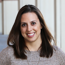 Andrea Stewart headshot in front of stadium